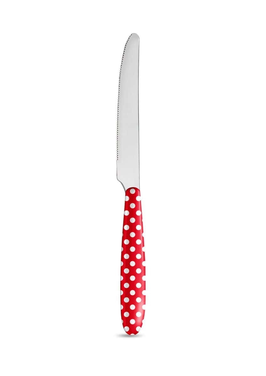Червен и бял нож на точки на бял фон.